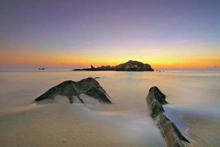 Photo of an Island during Sunset