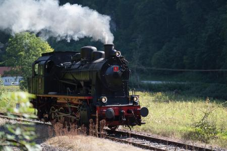 Photo of Black and Brown Train