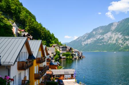 Photo Of Body of Water Beside Houses