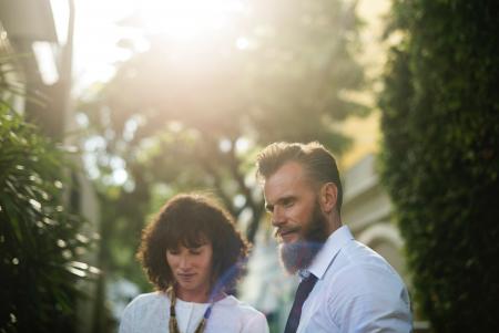 Photo of Couple Wearing White Shirts