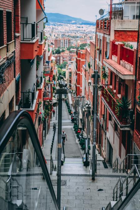 Photo of Downstairs Between Orange Buildings