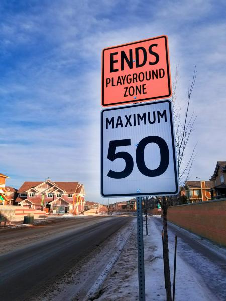 Photo of Ends Playground Zone Maximum 50 Street Sign