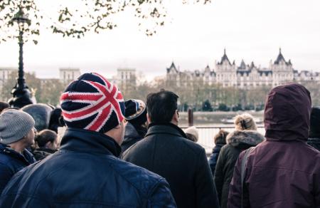 Photo of Group of People Standing in Front of Building