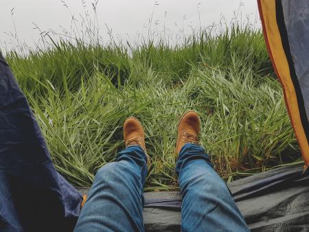 Photo of Man in Blue Jeans and Work Boots