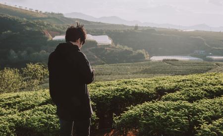 Photo of Man Standing on Field