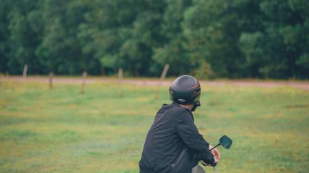 Photo of Man Wearing Black Helmet With Green Leaf Tree Plants