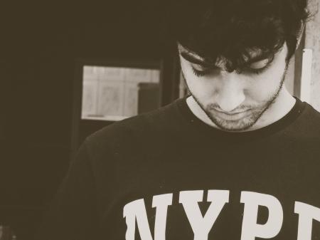 Photo Of Man Wearing NYPD Crew-neck Shirt