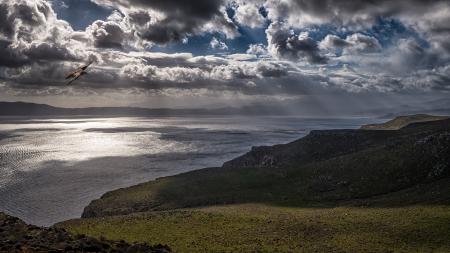 Photo of Ocean Under Cloudy Sky