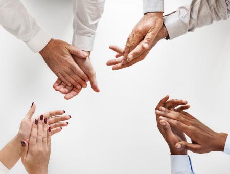 Photo of People Clapping Their Hands