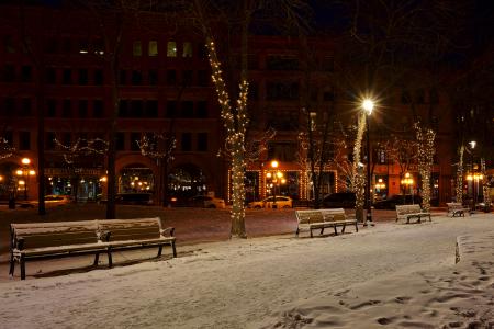 Photo of Snow Covered Benches in the Street