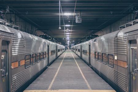 Photo Of Two Grey Trains In Station