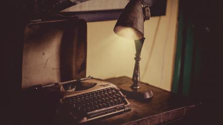 Photo of Vintage Typewriter and Lamp