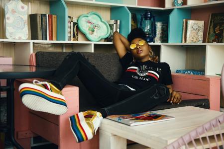 Photo of Woman Sitting on Couch