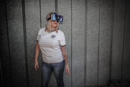 Photo of Woman Using Virtual Reality Headset