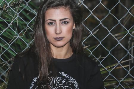 Photo of Woman Wearing Black Crew Neck Shirt