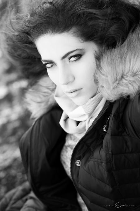 Photo of Woman Wearing Brown and Black Zip-up Parka Jacket