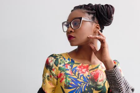 Photo of Woman Wearing Yellow Floral Top