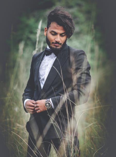 Photography of a Man Wearing Black Suit
