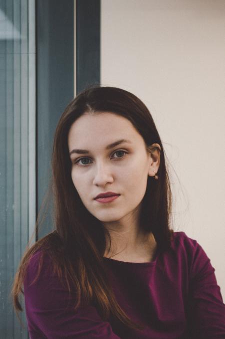 Photography of a Woman Wearing Purple Top