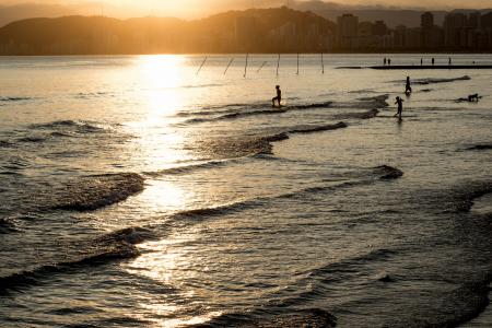 Photography of Body of Water during Sunset