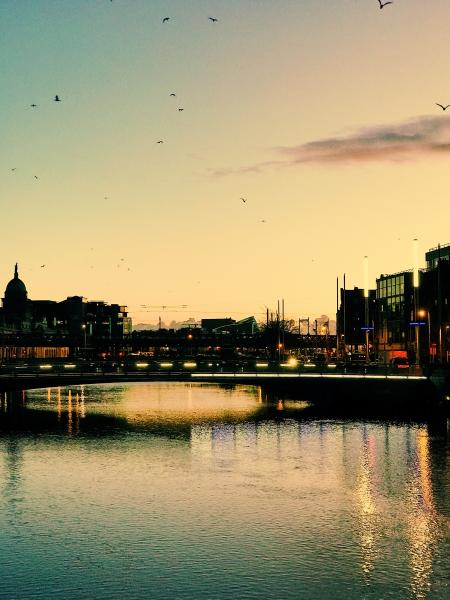 Photography of Building Beside Body of Water during Sunset