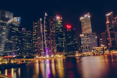 Photography Of High-Rise Building At Night Time