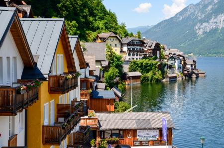 Photography of Houses Beside Body of Water