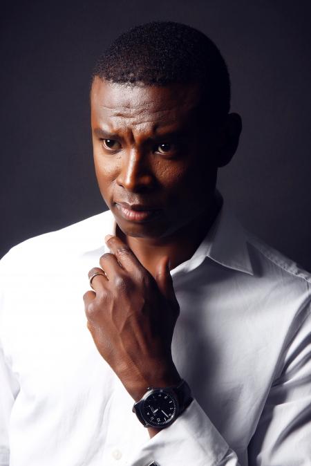 Photography of Man in White Shirt With Round Black Analog Watch