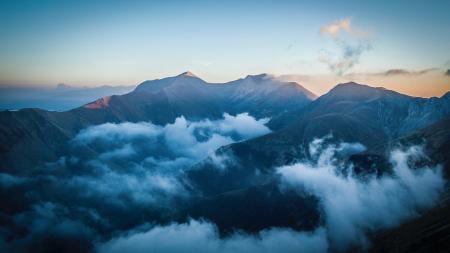 Photography of Mountain With Blue Sky As Backgroundw