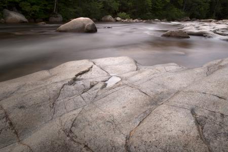 Photography of Rock Formation on Body of Water