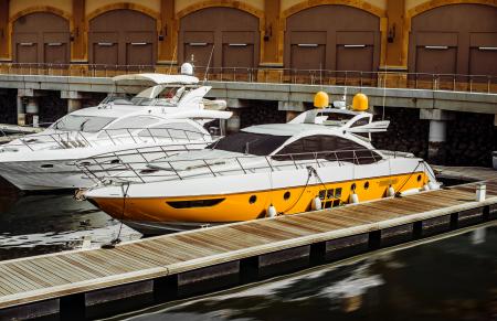 Photography of Two White Yacht on Body of Water