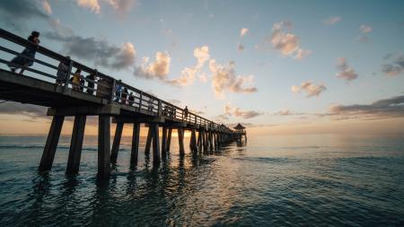 Pier on Sea Against Cloudy Sky