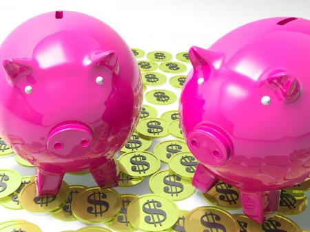 Piggybanks On Coins Shows American Earnings