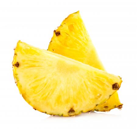 Pineapple with slices isolated on white