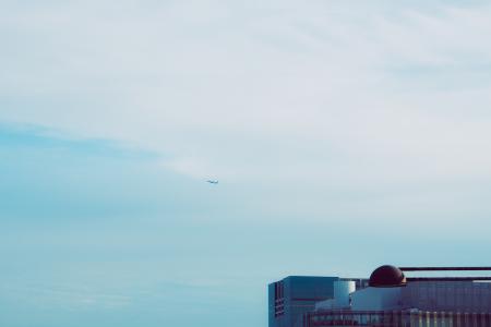 Plane Flying on Blue Sky