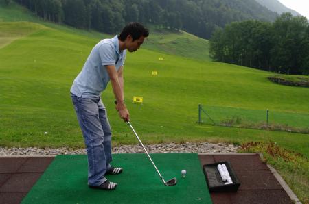 Player practicing golf
