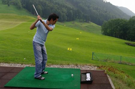 Player practicing golf