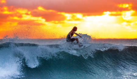 Playing with the Waves at Sunset