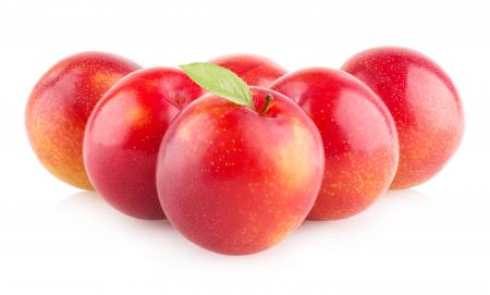 Plums isolated on white background