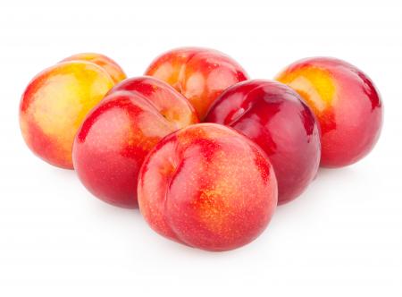 Plums isolated on white background