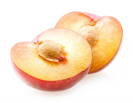 Plums isolated on white background