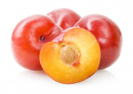 Plums isolated on white background