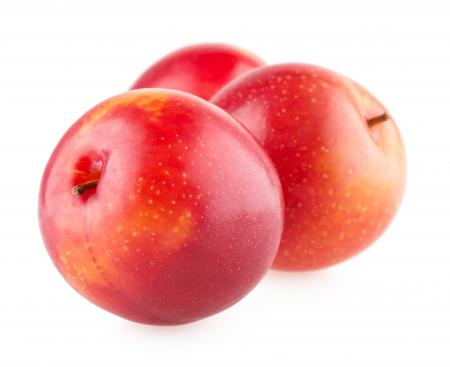 Plums isolated on white background