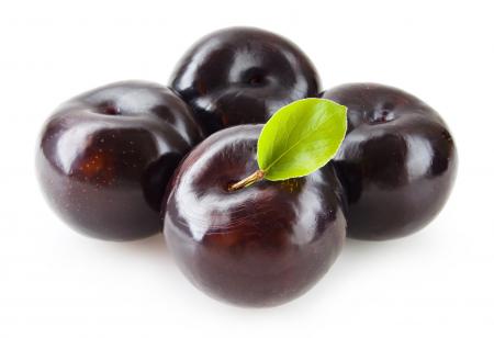 Plums isolated on white background