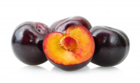 Plums isolated on white background