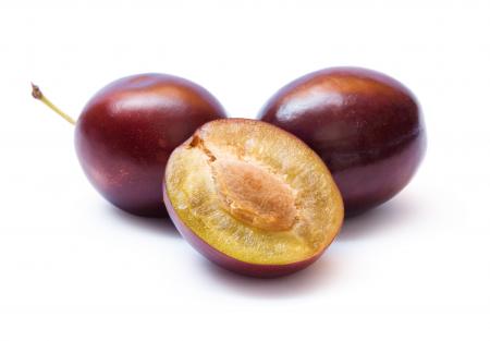 Plums isolated on white background