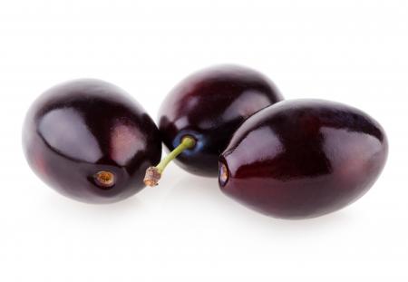 Plums isolated on white background