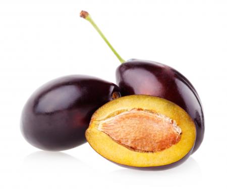 Plums isolated on white background