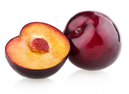 Plums isolated on white background