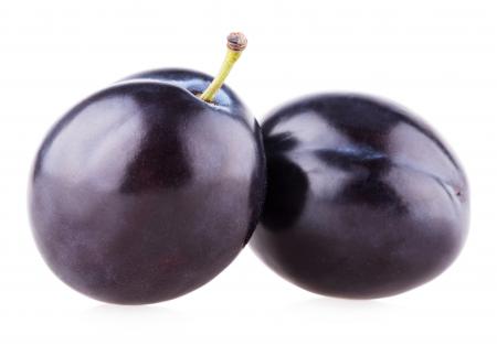 Plums isolated on white background